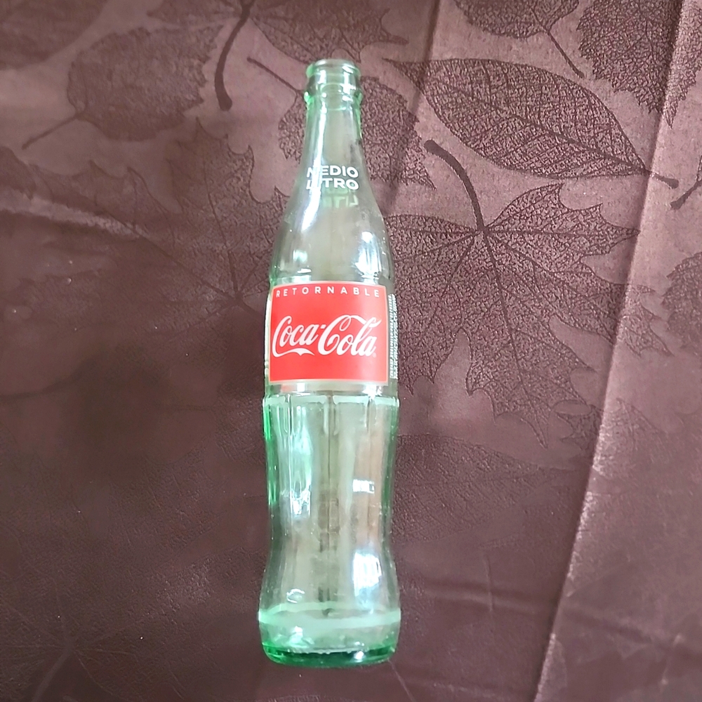 Empty Coke Cola glass bottle from Mexico